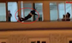 Çevredekilerin çığlıklarıyla intihar etti!