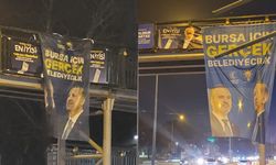 AKP’li aday, İYİ Parti’li adayın afişlerini kapattı